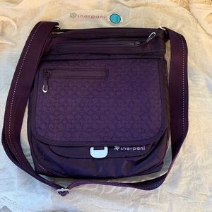 Purple Sherpani, travel purse